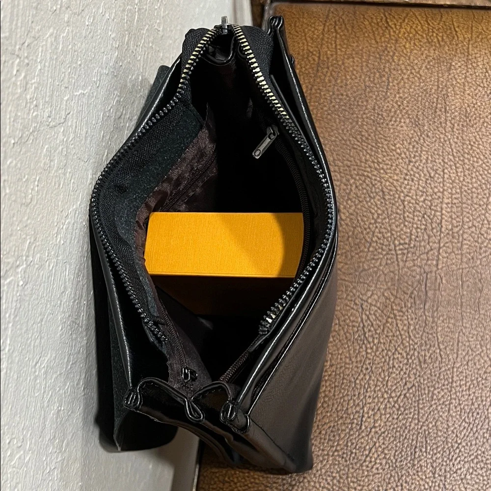 Like New Polo Videng Black Leather like Messenger Bag with 4 Zipper areas!